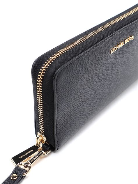 michael kors jet set logo continental wallet|Michael Kors travel continental wallet.